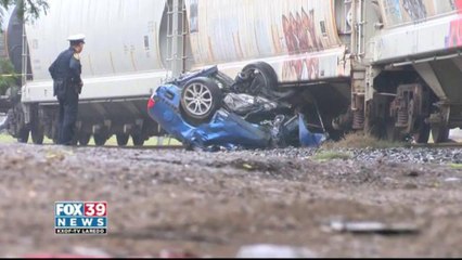 A 65 year old woman loses her life after driving into a train