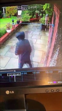 Burglar caught on camera breaking into Wigan house