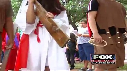 Youth performs Stations of the Cross