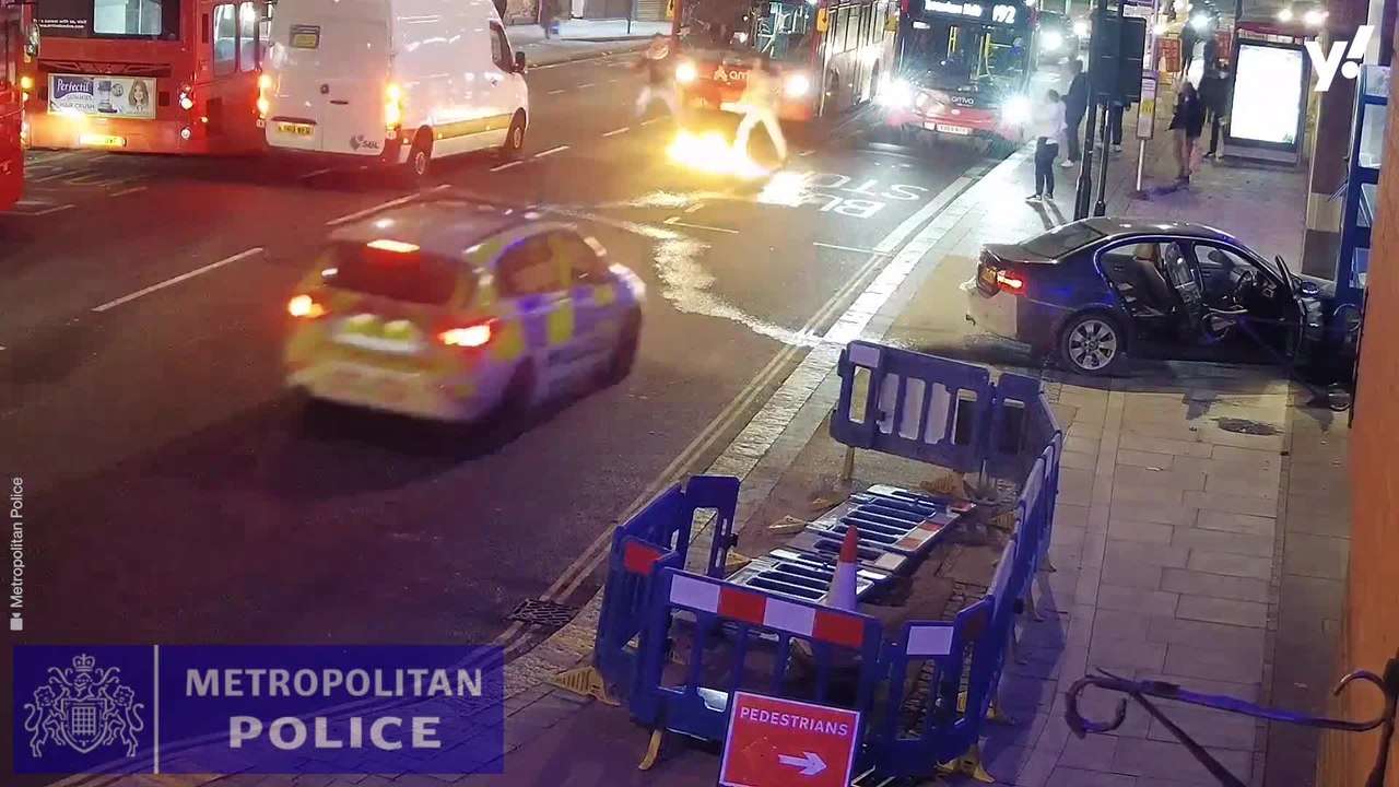 Man crashes car into police station then sets road on fire