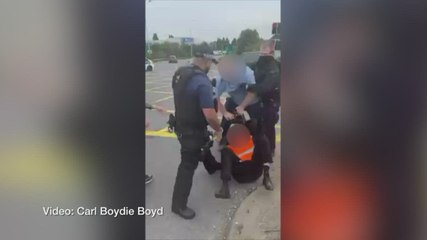 Protesters clash with police near M25