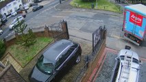 Footage shows moment van reverses into car