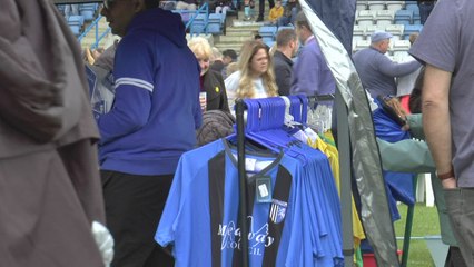 Gillingham fans pack the Priestfield pitch to meet the players at annual funday