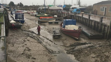 Car stuck in creek near Youngboats boatyard in Faversham