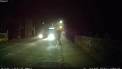 Taxi driver caught 'urinating' in street