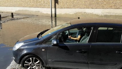 Car caught up in flooding in Faversham