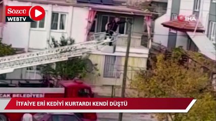 İtfaiye eri kediyi kurtarıp kendi düştü