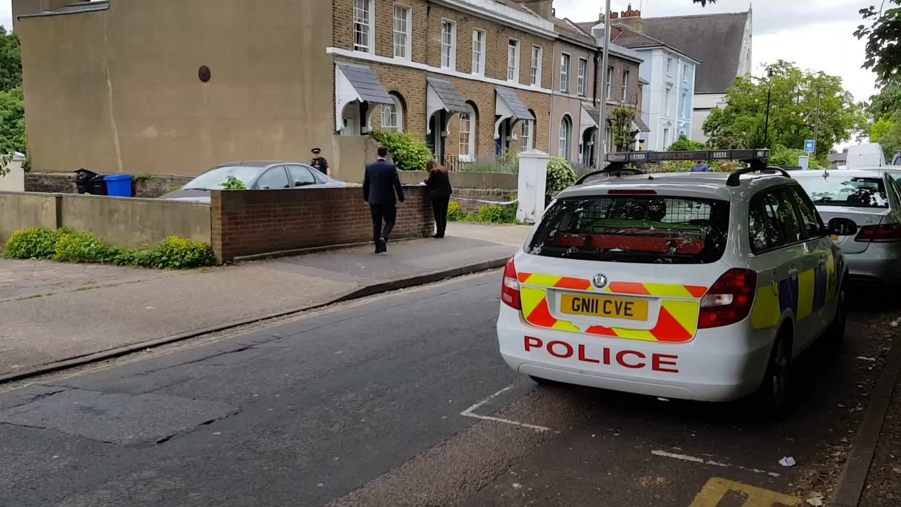 Police tape off building in Gravesend