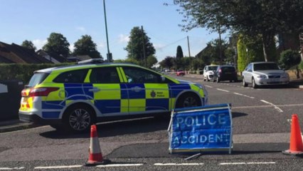 Man's body found in car in residential street