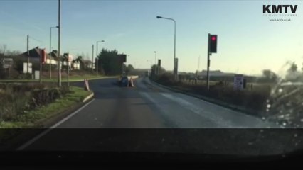 Car turns right at a junction in Barton Hill Drive, Minster