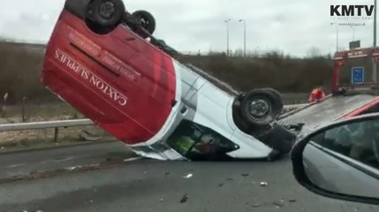 Van overturned on M2