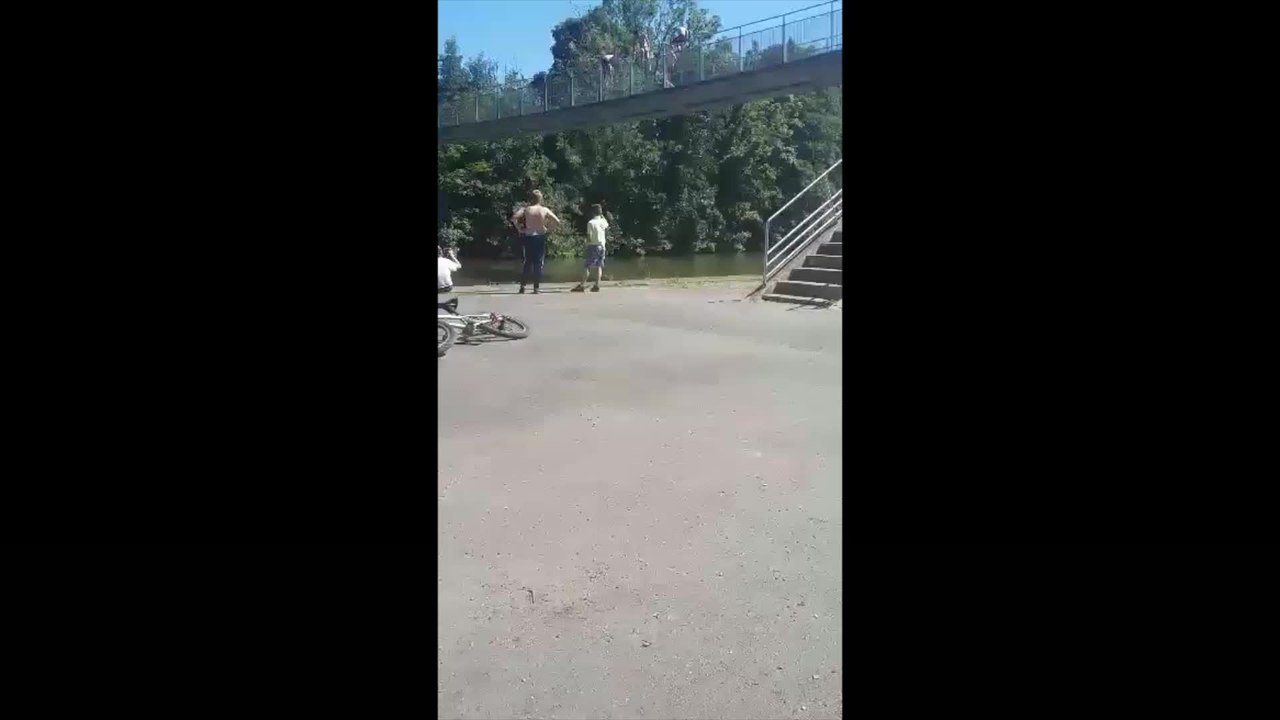 Children spotted jumping from bridge