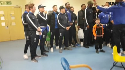 Gillingham FC players give some Christmas cheer to poorly children