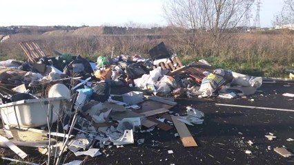 Mountain of rubbish dumped on road