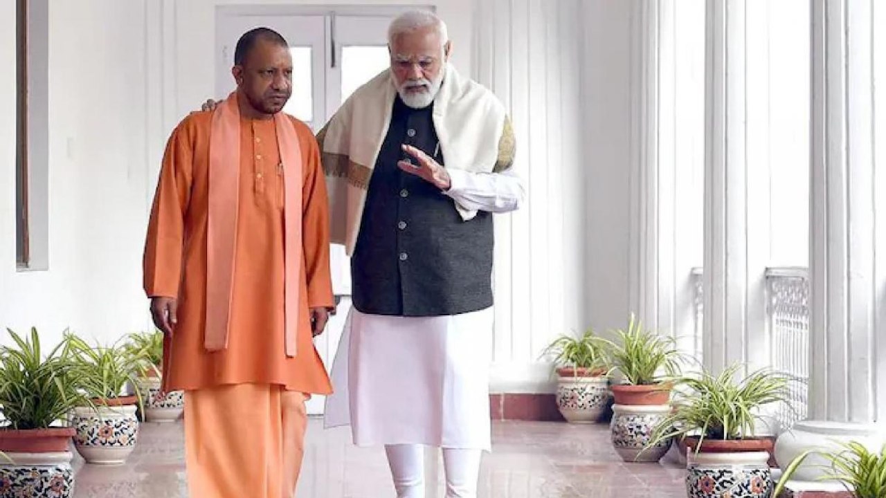 Dangal: Yogi posts pic with PM, political comme...
