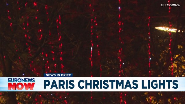 Christmas comes to the Champs Elysées as French pop star lights up Paris