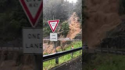 Flooding Waterfall Threatens Bridge