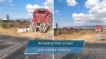 Taxi quiere ganarle el paso al tren y termina siendo embestido y arrastrado