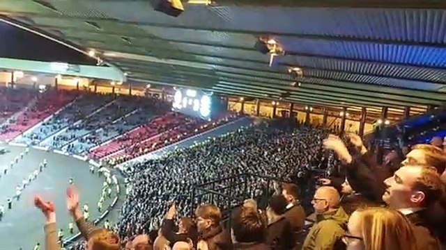 Hibs fans celebrate the final whistle at Hampden after their team's 3-1 semi-final victory over Rangers