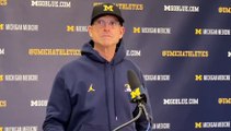 Jim Harbaugh and Gene Wojciechowski