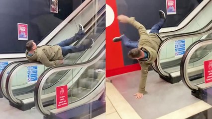 'English dad gets in on the 'Escalator Spin' craze'