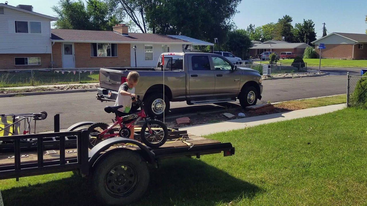 Son Jumping Bike off Trailer Faceplants