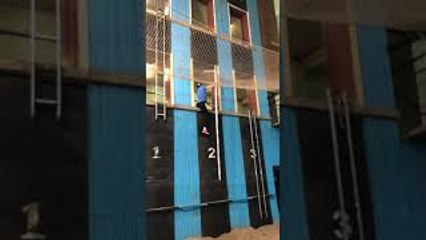 Competitive Firefighter Climbs Up Ladder