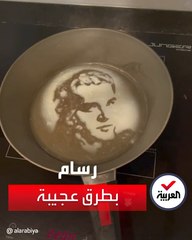 Download Video: رسام فيتنامي يبدع برسم لوحات فنية بيديه وقدميه بطرق مبتكرة