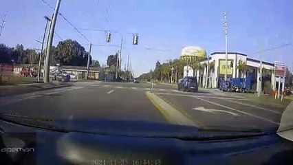 Distracted Driver Nearly Crashes