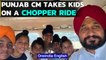 Punjab CM takes kids on a chopper ride, tweets selfies: Watch | Oneindia News