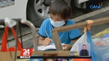 11-anyos na bata, nag-aaral at gumagawa ng modules sa bangketa | 24 Oras