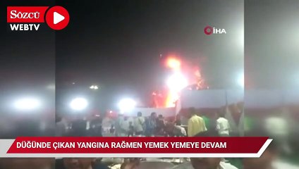 Düğünde çıkan yangına rağmen yemek yemeye devam ettiler