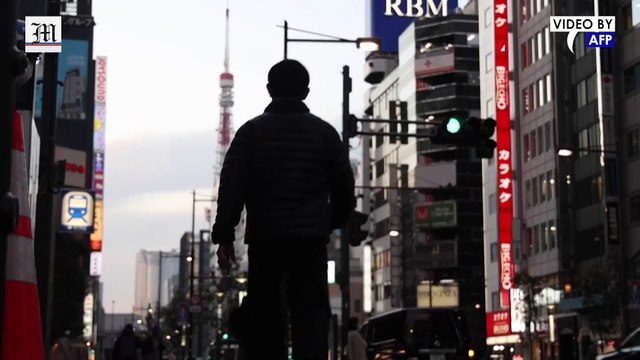 Tokyo residents react after Japan slams borders shut over Omicron fears