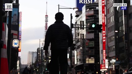 Tokyo residents react after Japan slams borders shut over Omicron fears