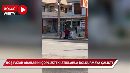 Yaşlı kadın, boş pazar arabasını çöplükteki atıklarla doldurmaya çalıştı