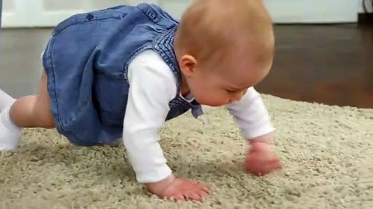 Baby Girl Crawling On The Floor