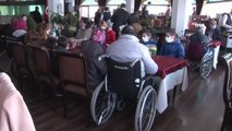 Dünya Engelliler Günü kapsamında 10 engelli vatandaşa 10 akülü sandalye hediye edildi