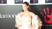 Rihanna Stuns In Orange Silk Dress As She’s Named A ‘National Hero’ In Barbados