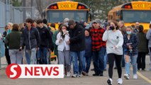 Three students shot dead, eight people wounded at Michigan high school