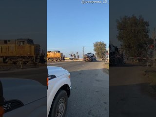 Stranded Truck Slammed By Freight Train