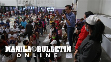Aksyon Demokratiko greet locals at the Meycauayan People’s Market in Bulacan