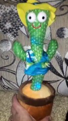 Dog Competes in a Dance off With Cactus Toy