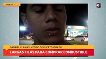 largas filas para comprar combustible