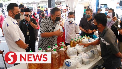 Hard hit families find bargains at Malaysian Family Sales