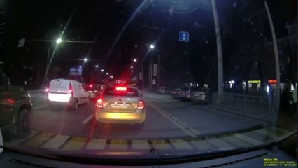Crossing Pedestrian Barely Missed by Bus