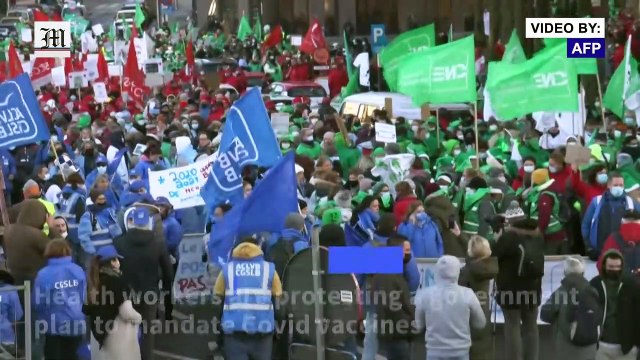 Thousands of Belgian health workers protest compulsory vaccination