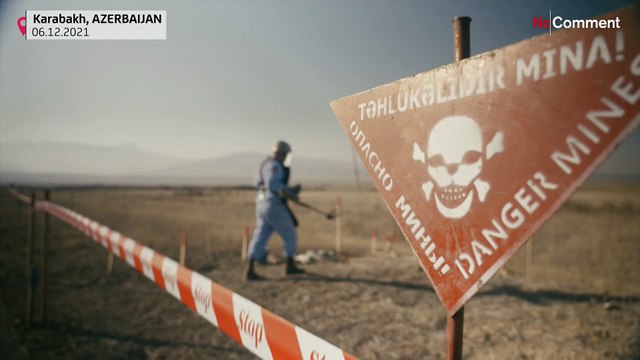 Azeri army defuse and destroy landmines left behind after the war