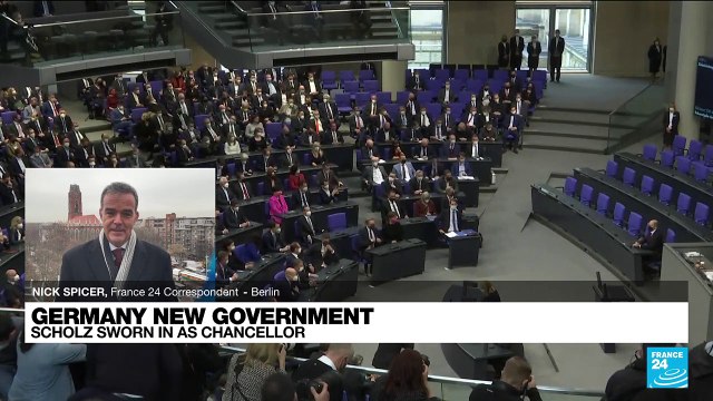 Scholz takes reins from Merkel for new German era