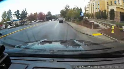 Attempt to Beat Yellow Light Ends in Crash in Front of Cop