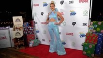 Katie Welch attends the 8th Annual Winter Wonderland Toys for Tots charity event red carpet in Los Angeles